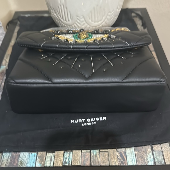 Kurt Geiger London
Mini Kensington Eye Crossbody Bag - Picture 15 of 15